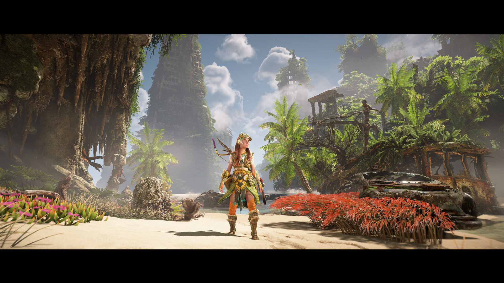 Aloy standing in a lush, overgrown ruin bathed in sunlight