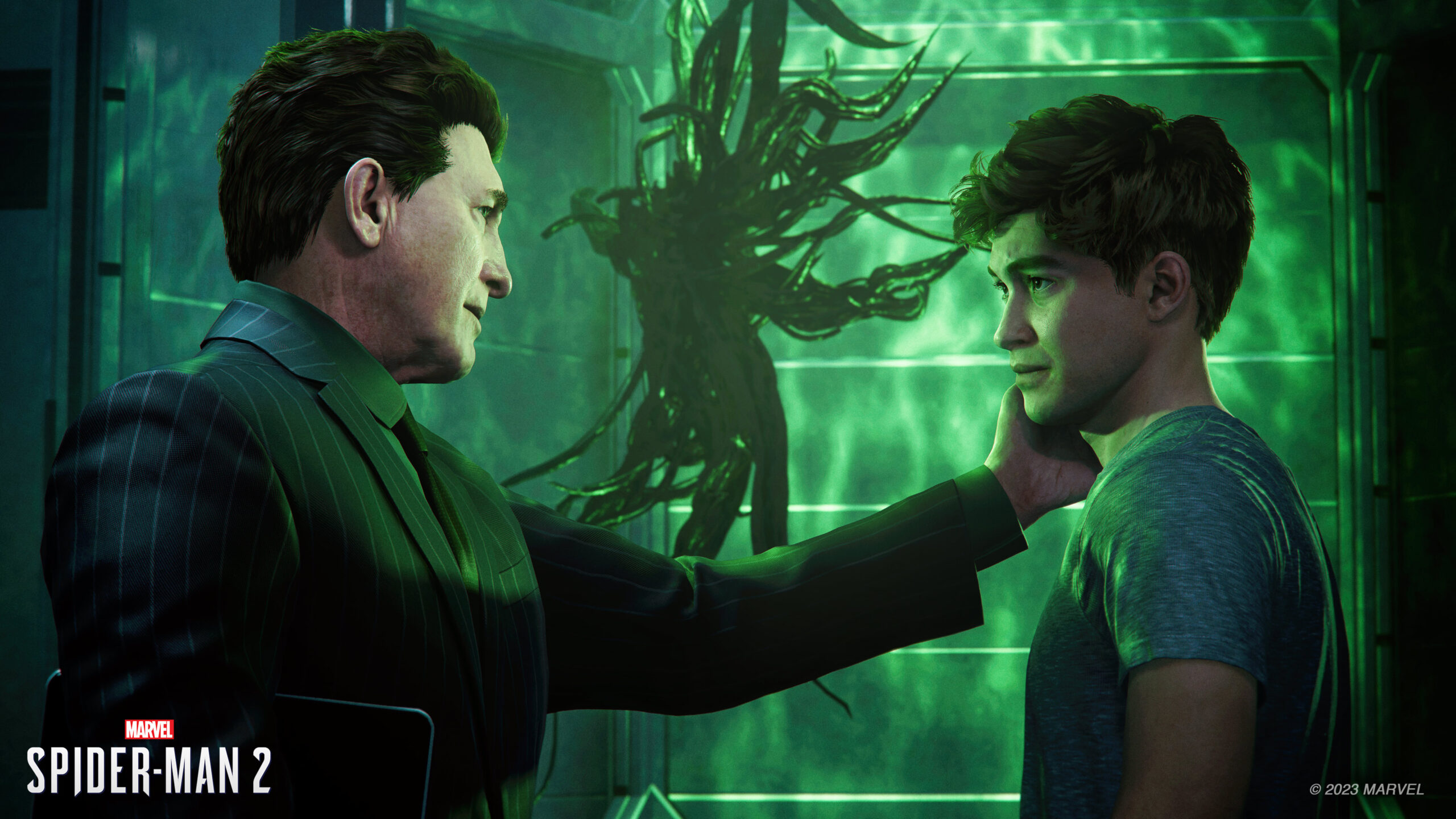 Norman Osborn assures his son Harry with the symbiote in the background