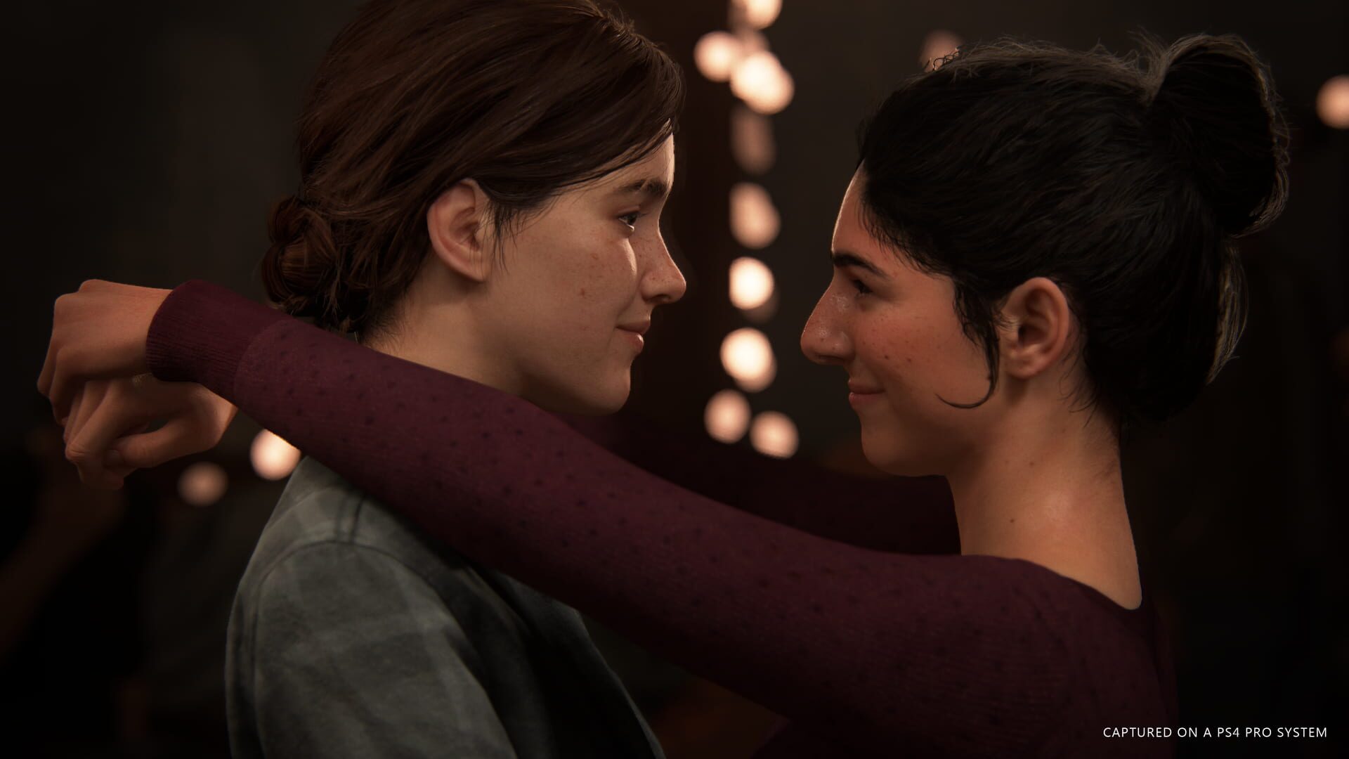 Ellie and Dina sharing a quiet dance